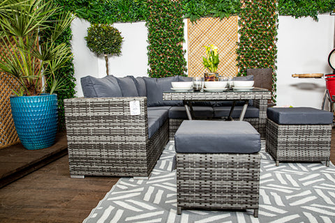 Ibiza - Compact Grey Rattan Corner Sofa Set with Glass Topped Dining Table, Two Stools & Anthracite Cushions