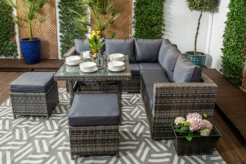 Ibiza - Compact Grey Rattan Corner Sofa Set with Glass Topped Dining Table, Two Stools & Anthracite Cushions